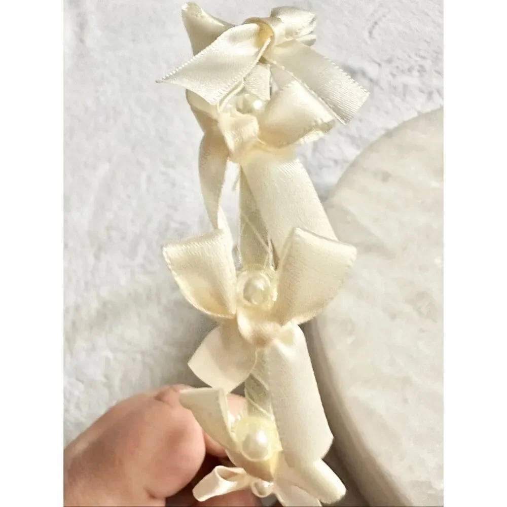 Off-white bow and faux pearl headband